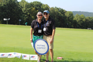 Pat and John volunteering at the BV Golf Tournament