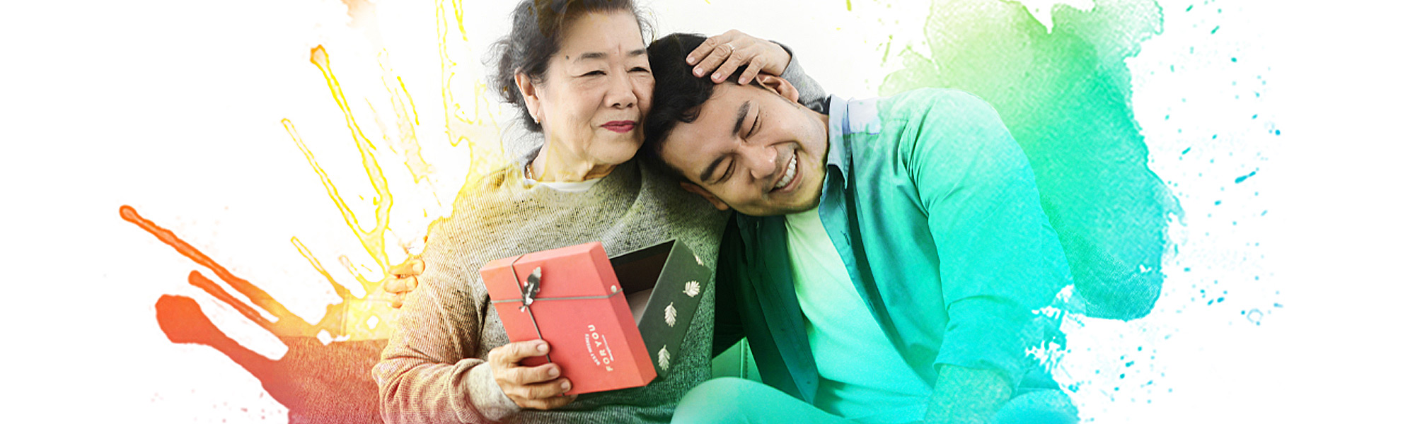 Happy mother opening a gift from her son