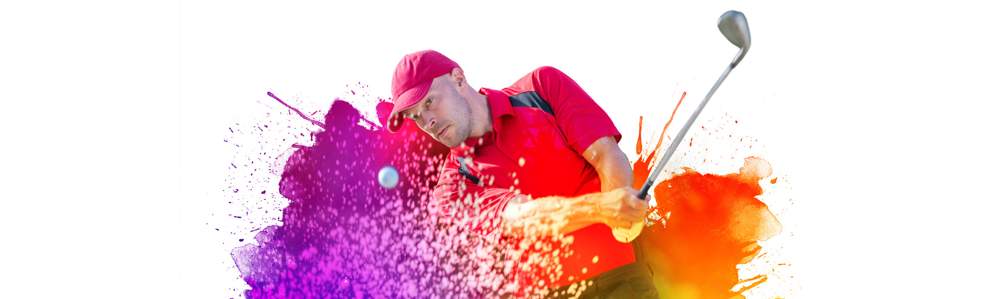 Golfer splashing ball out of a sand trap
