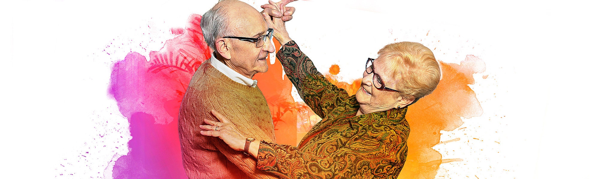 Resident couple having a good time dancing