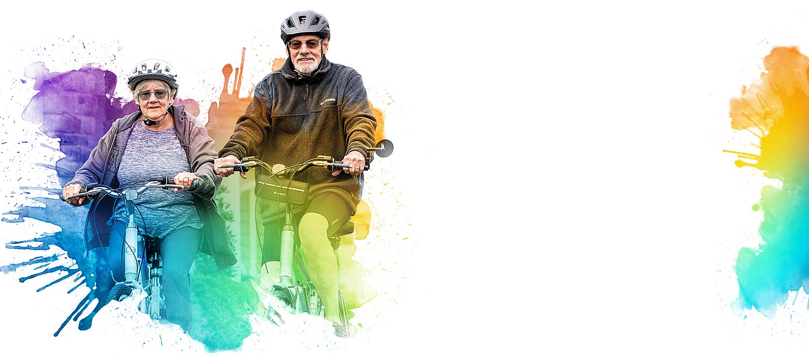 Resident couple enjoying a bicycle ride on campus